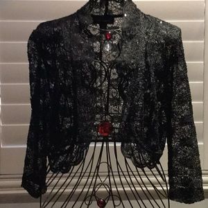 Beautiful top. Wear on top of tank or a dress